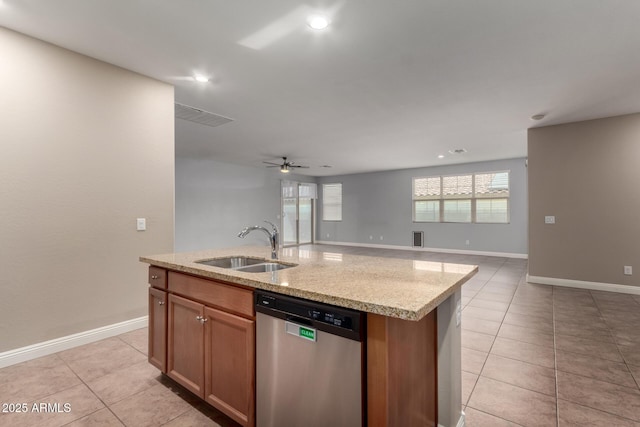 kitchen featuring ceiling fan, dishwasher, sink, a kitchen island with sink, and light tile patterned floors