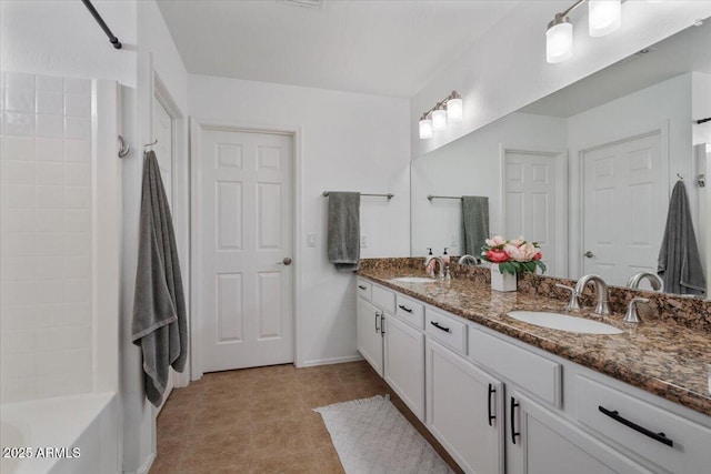 4323 E Dublin St, Gilbert, AZ 85295 - bathroom featuring double vanity, shower / bath combination, tile patterned floors, and baseboards