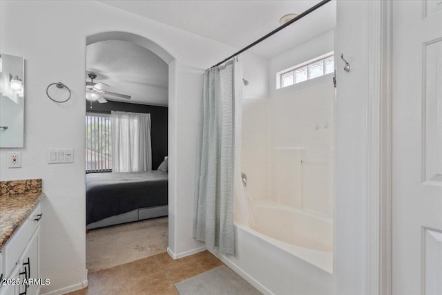 4323 E Dublin St, Gilbert, AZ 85295 - bathroom featuring vanity, ensuite bathroom, shower / tub combo, ceiling fan, and baseboards
