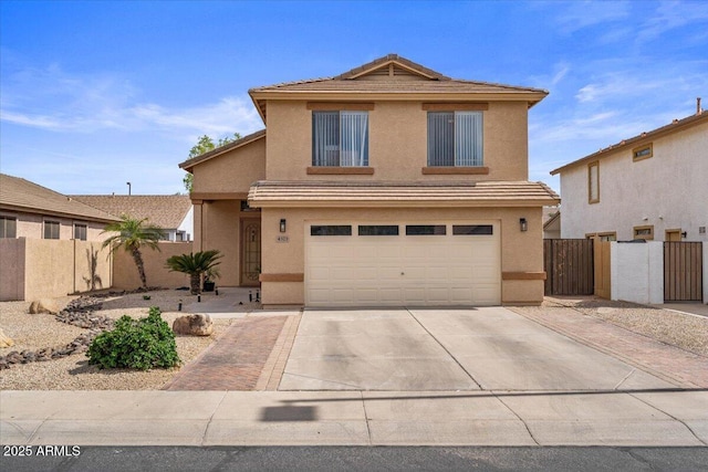 4323 E Dublin St, Gilbert, AZ 85295 - traditional home featuring stucco siding, concrete driveway, a tiled roof, a garage, and a gate
