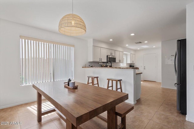 4323 E Dublin St, Gilbert, AZ 85295 - dining area with light tile patterned floors, baseboards, and recessed lighting
