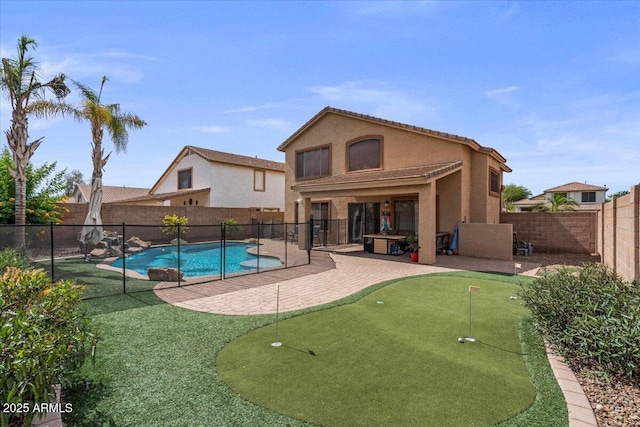 4323 E Dublin St, Gilbert, AZ 85295 - view of pool featuring a putting green, a patio area, and a fenced backyard