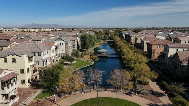 bird's eye view with a water and mountain view