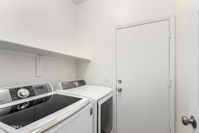12355 W Hadley St, Avondale, AZ 85323 - clothes washing area with independent washer and dryer