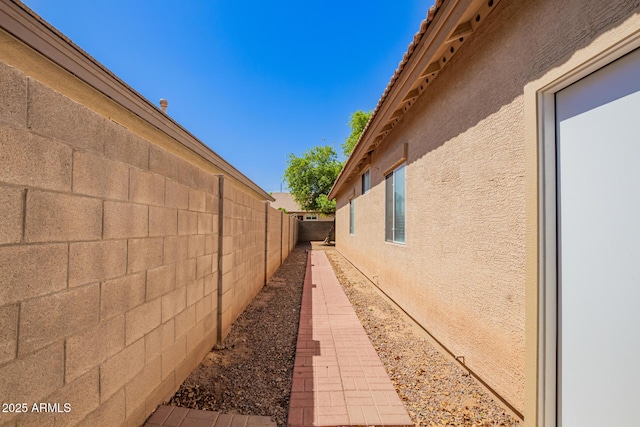 12355 W Hadley St, Avondale, AZ 85323 - view of property exterior with fence and stucco siding