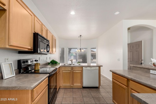 12355 W Hadley St, Avondale, AZ 85323 - kitchen featuring black appliances, a sink, a peninsula, arched walkways, and light tile patterned floors
