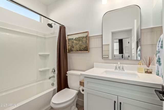 full bathroom with vanity, toilet, and shower / bath combo with shower curtain