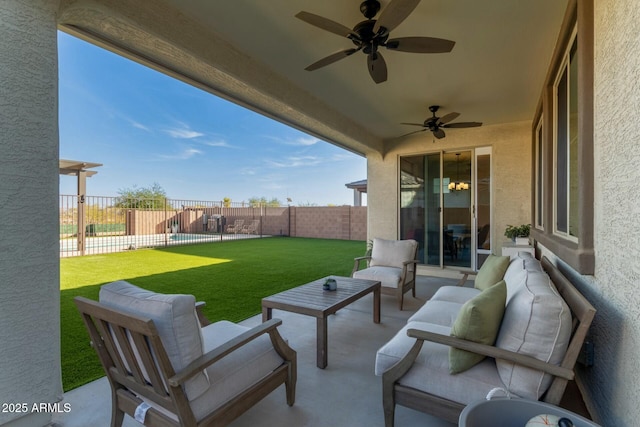 view of patio with an outdoor living space and ceiling fan