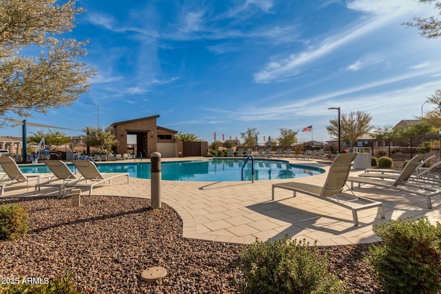 view of swimming pool featuring a patio