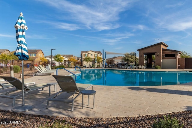 view of swimming pool featuring a patio area