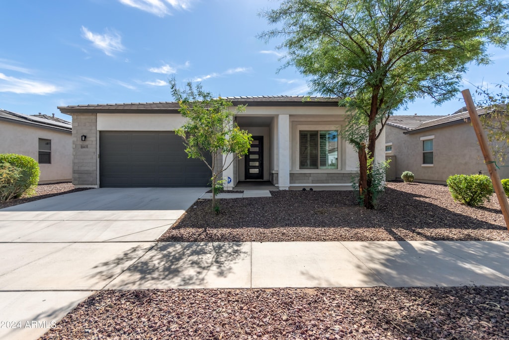 view of front of home with a garage