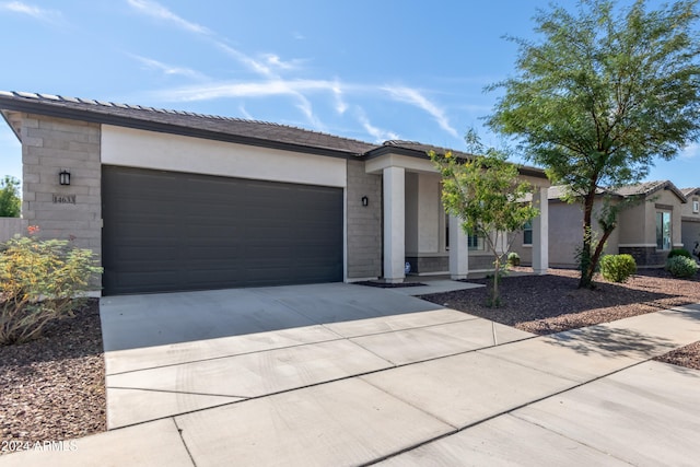 view of front of home with a garage