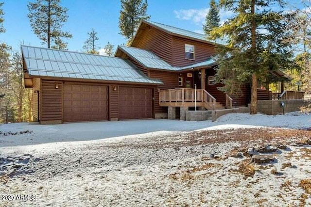 log cabin with a garage