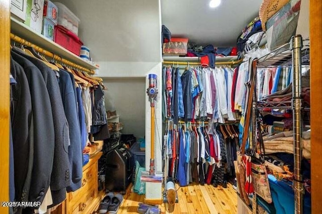 walk in closet featuring hardwood / wood-style floors