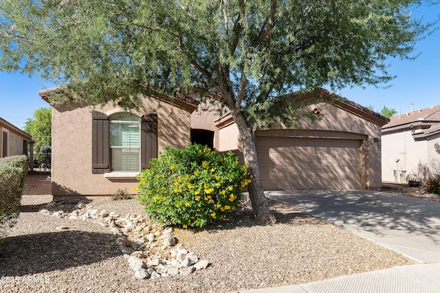 4245 E Ficus Way, Gilbert, AZ 85298 - view of front of house featuring concrete driveway, stucco siding, and a garage