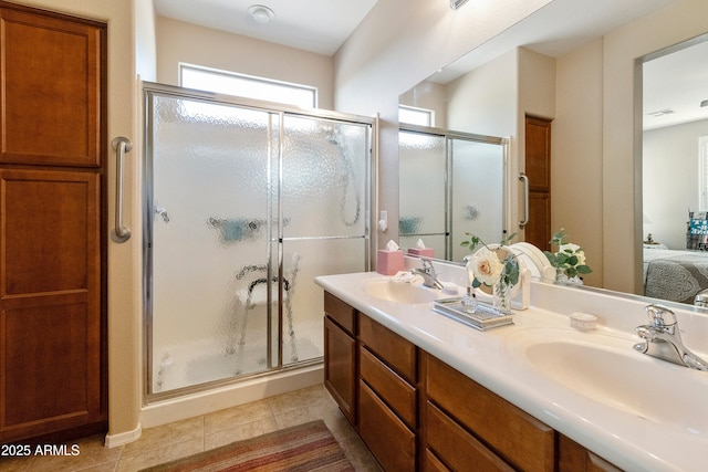 4245 E Ficus Way, Gilbert, AZ 85298 - bathroom with a stall shower, connected bathroom, double vanity, and tile patterned flooring