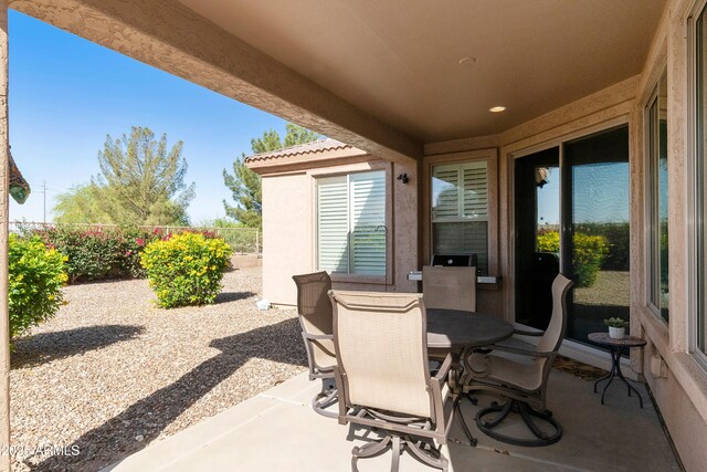 4245 E Ficus Way, Gilbert, AZ 85298 - view of patio / terrace with fence and outdoor dining area