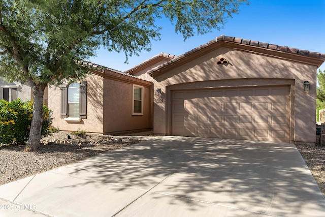 4245 E Ficus Way, Gilbert, AZ 85298 - view of front of house featuring driveway, an attached garage, stucco siding, and a tile roof