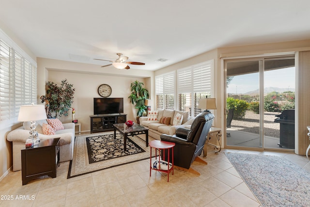 4245 E Ficus Way, Gilbert, AZ 85298 - living room featuring ceiling fan and light tile patterned flooring