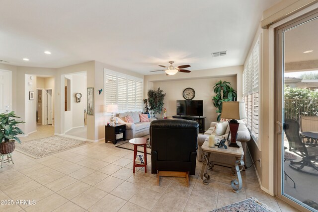 4245 E Ficus Way, Gilbert, AZ 85298 - living room with ceiling fan, light tile patterned floors, recessed lighting, and baseboards