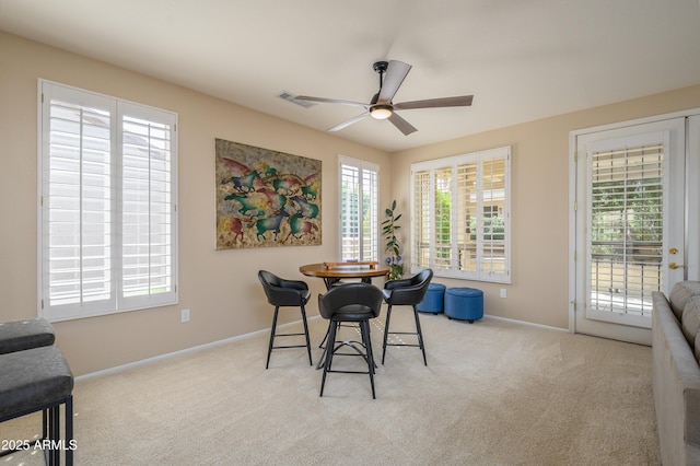 15134 W Waterford Dr, Surprise, AZ 85374 - carpeted dining area featuring visible vents, ceiling fan, and baseboards