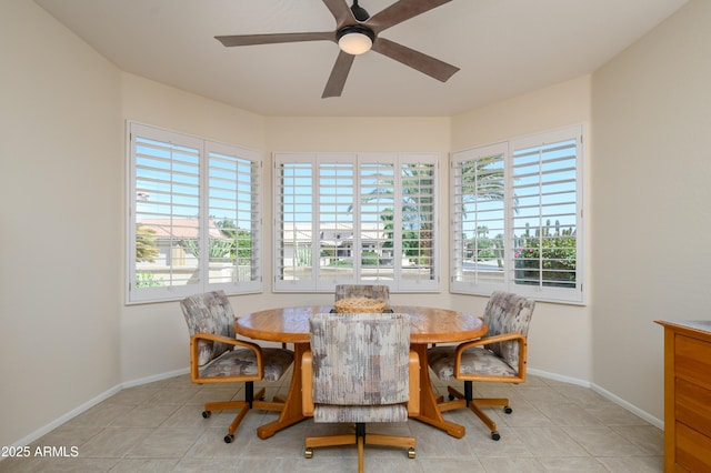 15134 W Waterford Dr, Surprise, AZ 85374 - dining area with ceiling fan, baseboards, and a wealth of natural light