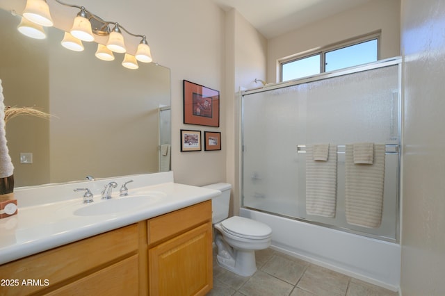 15134 W Waterford Dr, Surprise, AZ 85374 - bathroom with toilet, shower / bath combination with glass door, vanity, and tile patterned flooring