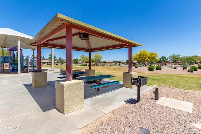 view of home's community with a gazebo, a playground, and a lawn