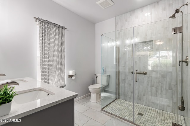 6156 W Del Rio St, Chandler, AZ 85226 - full bath with vanity, a stall shower, tile patterned flooring, and toilet