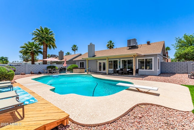 6156 W Del Rio St, Chandler, AZ 85226 - view of swimming pool with a fenced backyard, a patio area, central air condition unit, and a diving board