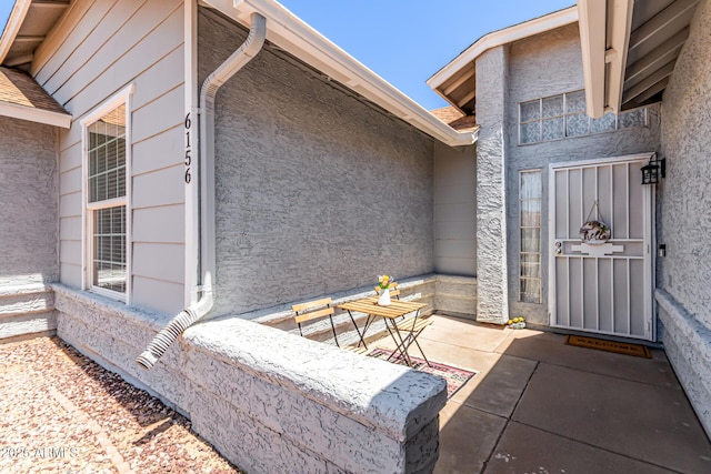 6156 W Del Rio St, Chandler, AZ 85226 - doorway to property featuring stucco siding