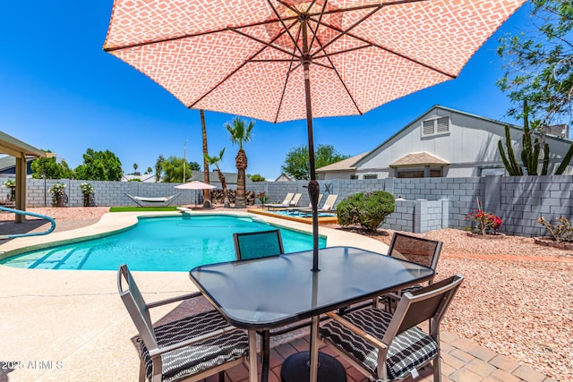 6156 W Del Rio St, Chandler, AZ 85226 - view of swimming pool with a fenced backyard, a patio, and outdoor dining area