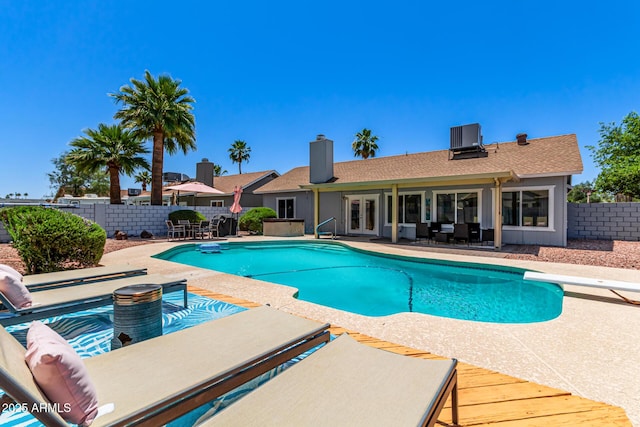 6156 W Del Rio St, Chandler, AZ 85226 - view of swimming pool with a diving board, french doors, a patio, and central AC