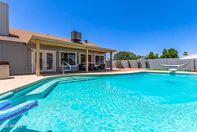 6156 W Del Rio St, Chandler, AZ 85226 - view of pool featuring french doors, central AC unit, a fenced backyard, and a patio area
