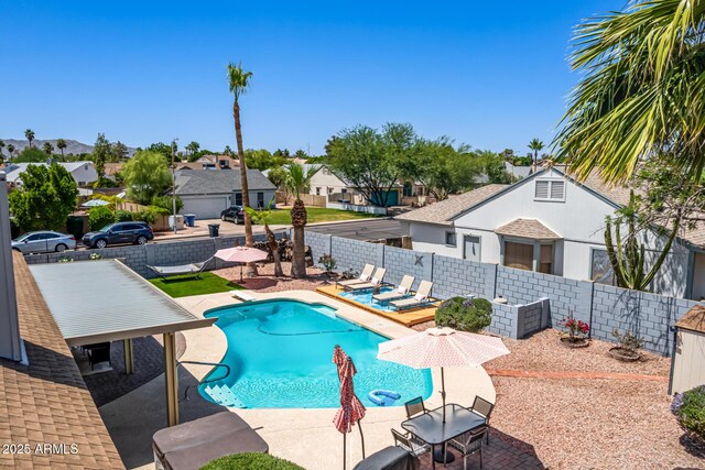 6156 W Del Rio St, Chandler, AZ 85226 - view of swimming pool featuring a residential view, a fenced backyard, and a patio area
