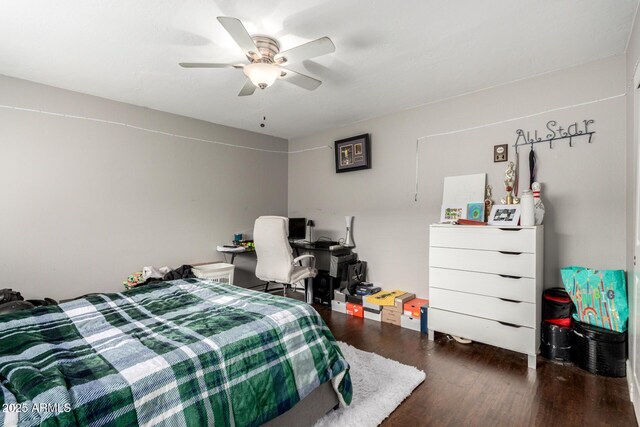 bedroom with ceiling fan and wood finished floors