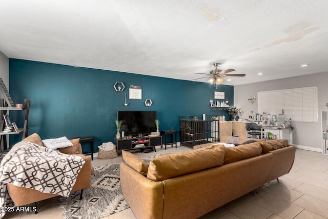 tiled living area with recessed lighting, baseboards, and ceiling fan
