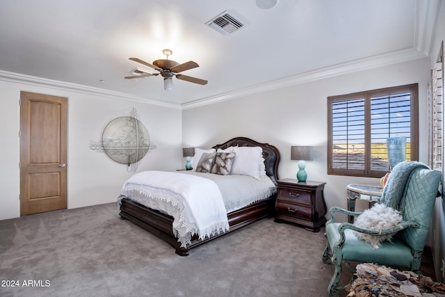 carpeted bedroom featuring ceiling fan and ornamental molding