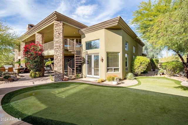 rear view of house featuring a patio area