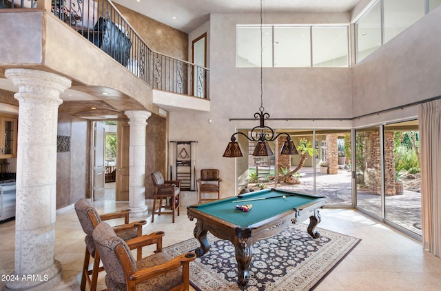 recreation room with ornate columns, a high ceiling, and billiards