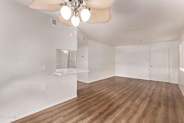 12221 W Bell Rd Unit 249, Surprise, AZ 85378 - unfurnished living room with ceiling fan, wood finished floors, baseboards, and vaulted ceiling