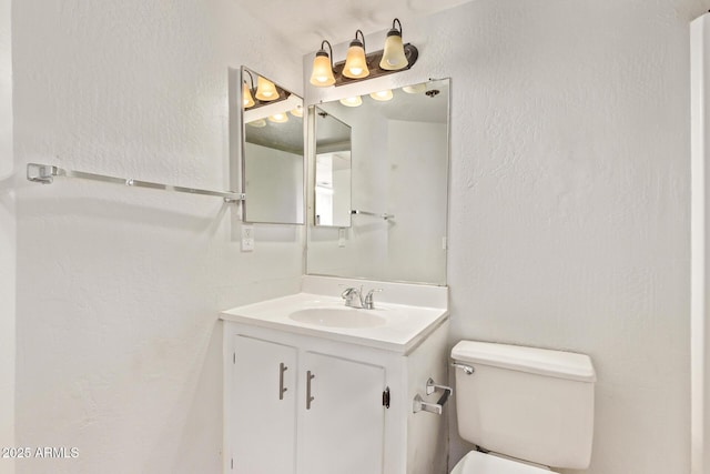 12221 W Bell Rd Unit 249, Surprise, AZ 85378 - bathroom featuring toilet and vanity
