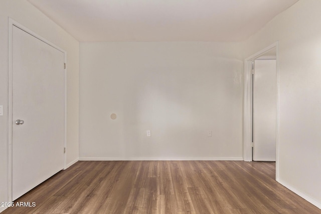 12221 W Bell Rd Unit 249, Surprise, AZ 85378 - empty room with wood finished floors and baseboards