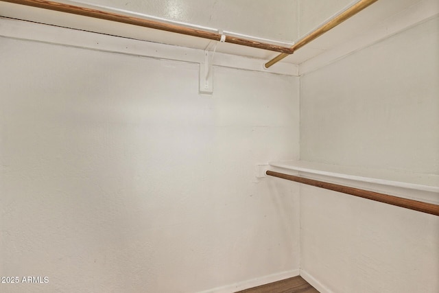 12221 W Bell Rd Unit 249, Surprise, AZ 85378 - spacious closet featuring wood finished floors