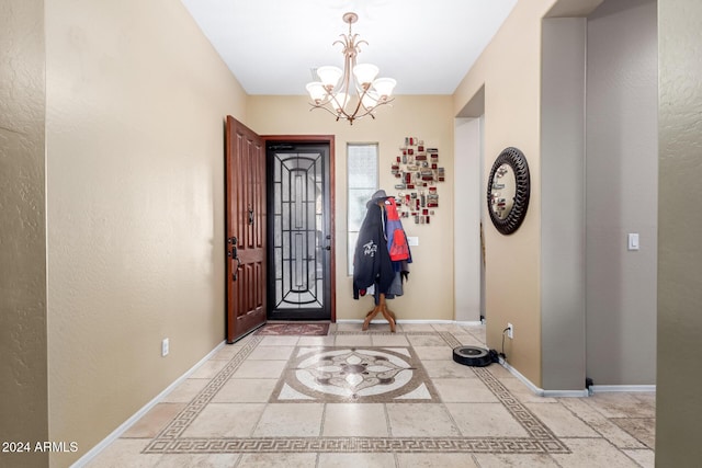 entrance foyer with a chandelier