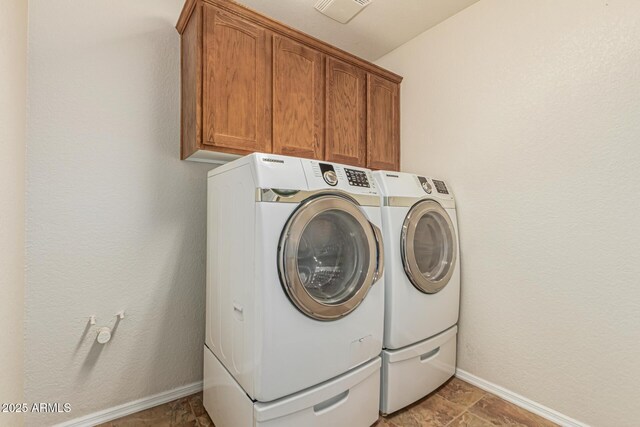 10940 E Olla Ave, Mesa, AZ 85212 - laundry area featuring washing machine and dryer, cabinet space, and baseboards