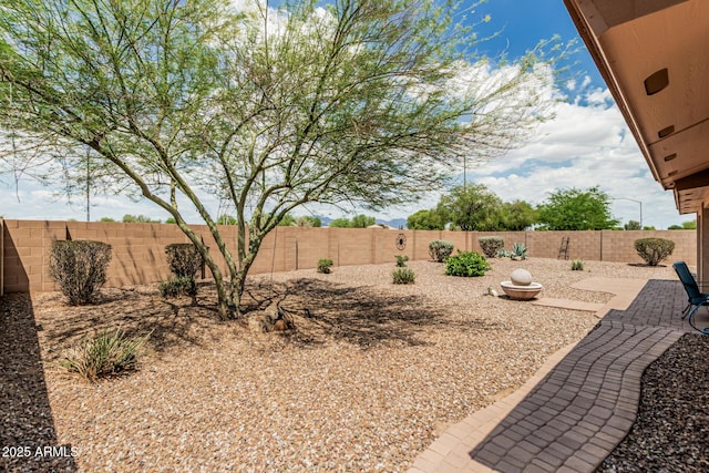 10940 E Olla Ave, Mesa, AZ 85212 - fenced backyard with a patio area