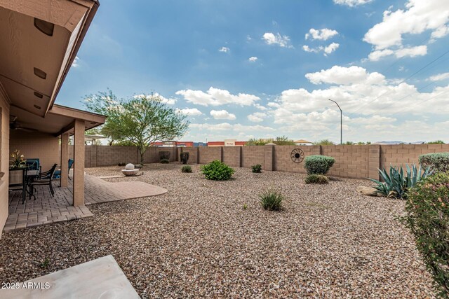 10940 E Olla Ave, Mesa, AZ 85212 - fenced backyard with a patio area