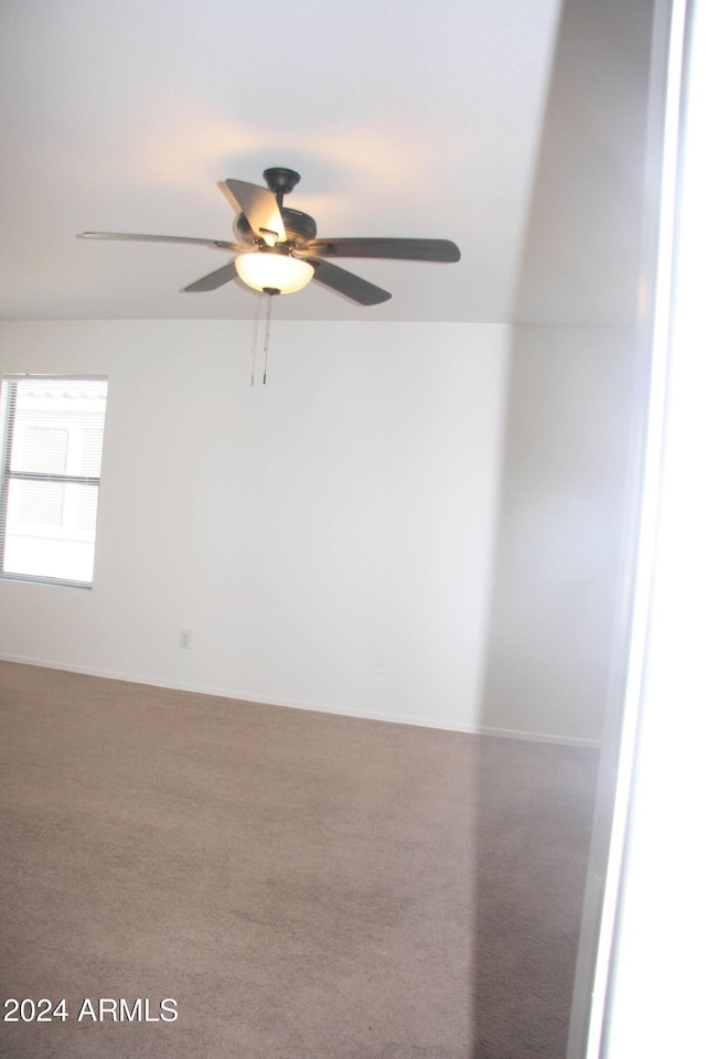 9527 N 82nd Ln, Peoria, AZ 85345 - carpeted spare room with ceiling fan