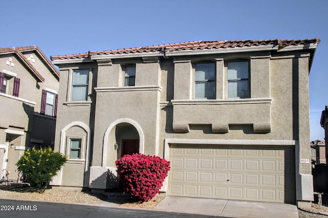 9527 N 82nd Ln, Peoria, AZ 85345 - view of front of home featuring a garage